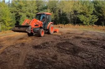 how to level land with a tractor