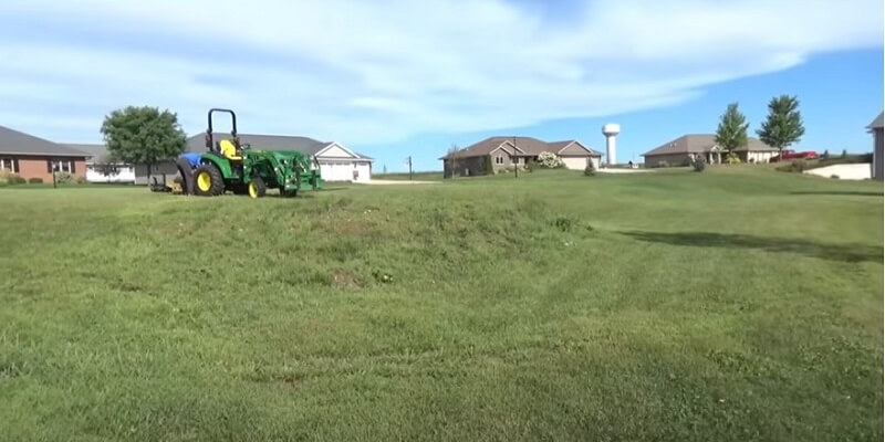 how to level yard with tractor