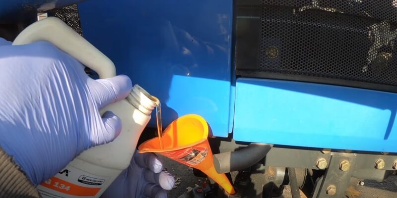 how to check hydraulic fluid on new holland tractor